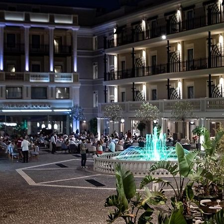Palazzo Doglio Hotel Cagliari Exterior photo The hotel's central courtyard
