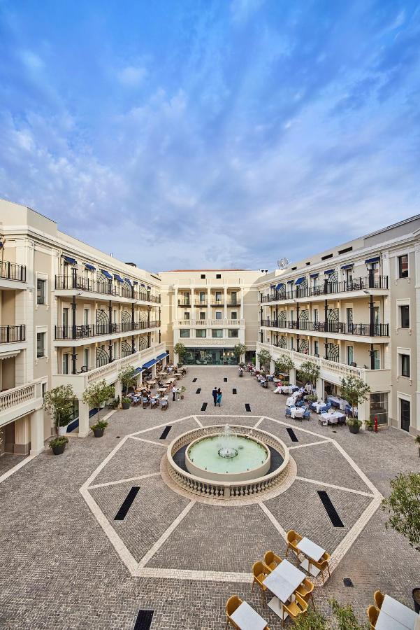 Palazzo Doglio Hotel Cagliari Exterior photo The courtyard of the hotel