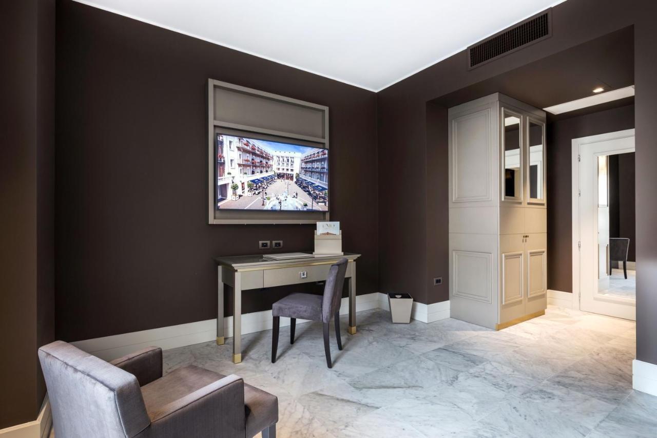 Palazzo Doglio Hotel Cagliari Exterior photo A room at the hotel